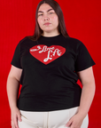 Marielena is 5'8" and wearing L I love LA Tourist Tee