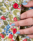 Off-White Strawberry Pantry Button-Up close up of red buttons