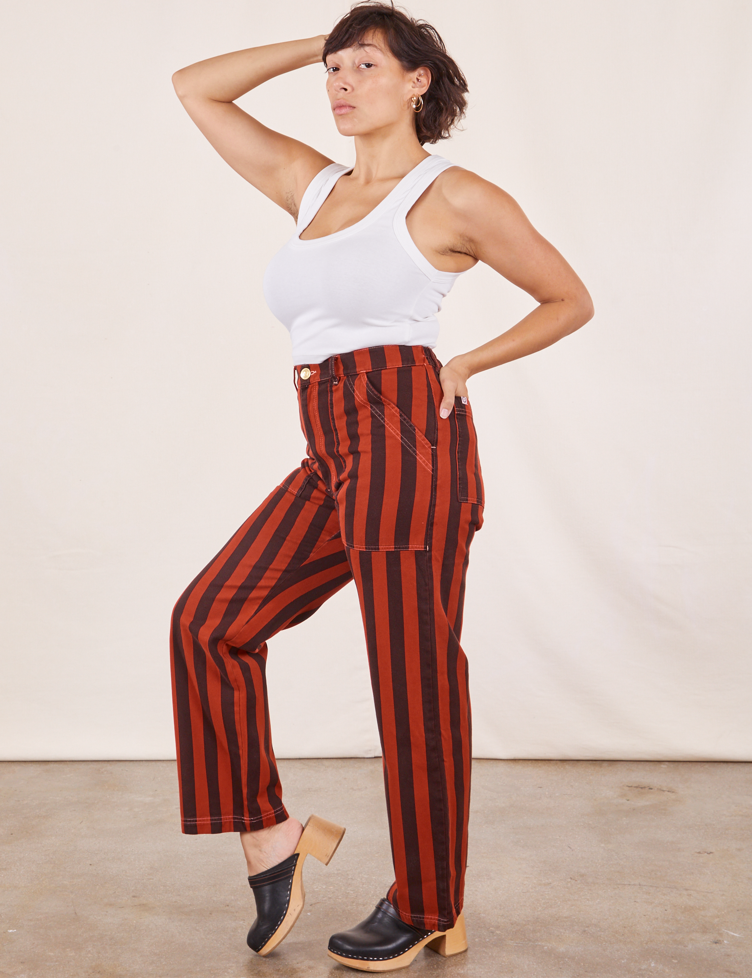 Side view of Black Striped Work Pants in Paprika and vintage off-white Cropped Tank Top on Tiara