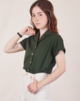 Pantry Button-Up in Swamp Green front angled view on Hana