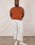 Elijah is 6’0 and wearing 3XL Tank Top in Burnt Terracotta paired with vintage tee off-white Western pants