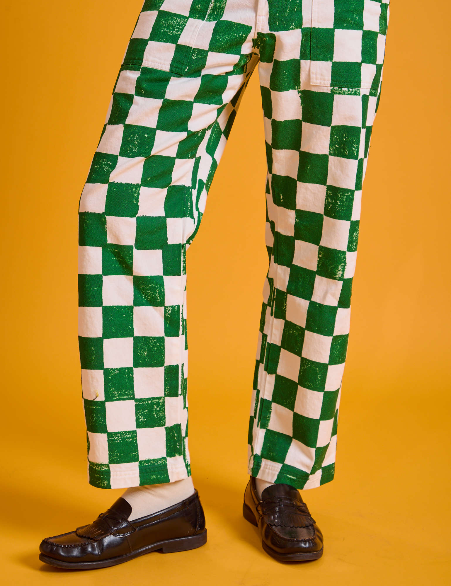 Checkerboard Work Pants in White/Green pant leg close up on Quinn