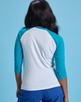 Taxi Raglan Tee in San Francisco back view on Kandia