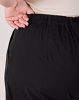Trouser Shorts in Basic Black back close up with elastic waistband on Ashley