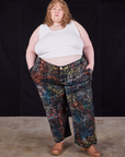 Catie is 5'11" and wearing 6XL Wavy Dye Work Pants paired with Cropped Tank in vintage tee off-white