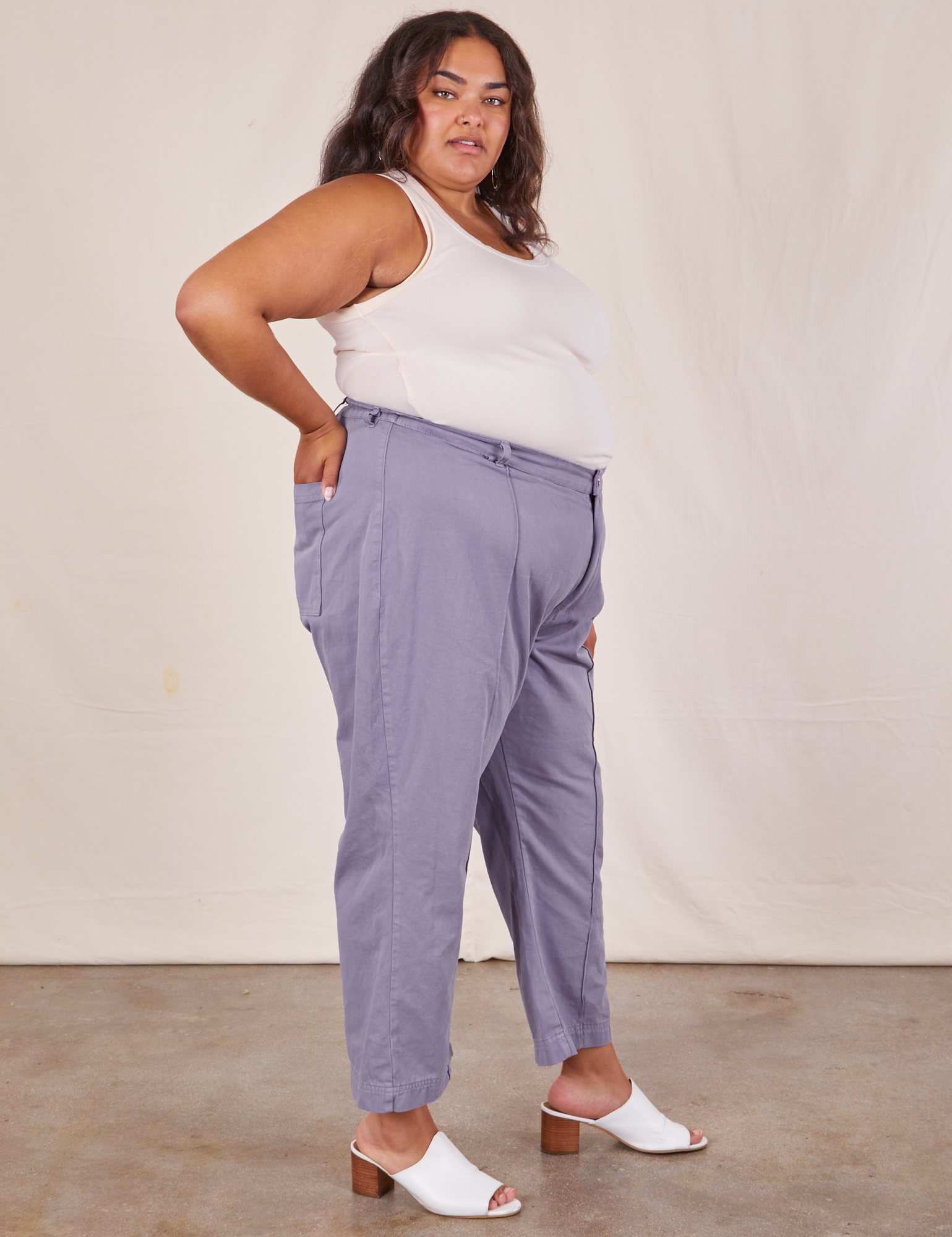 Side view of Western Pants in Faded Grape and Tank Top in vintage tee off-white on Alicia