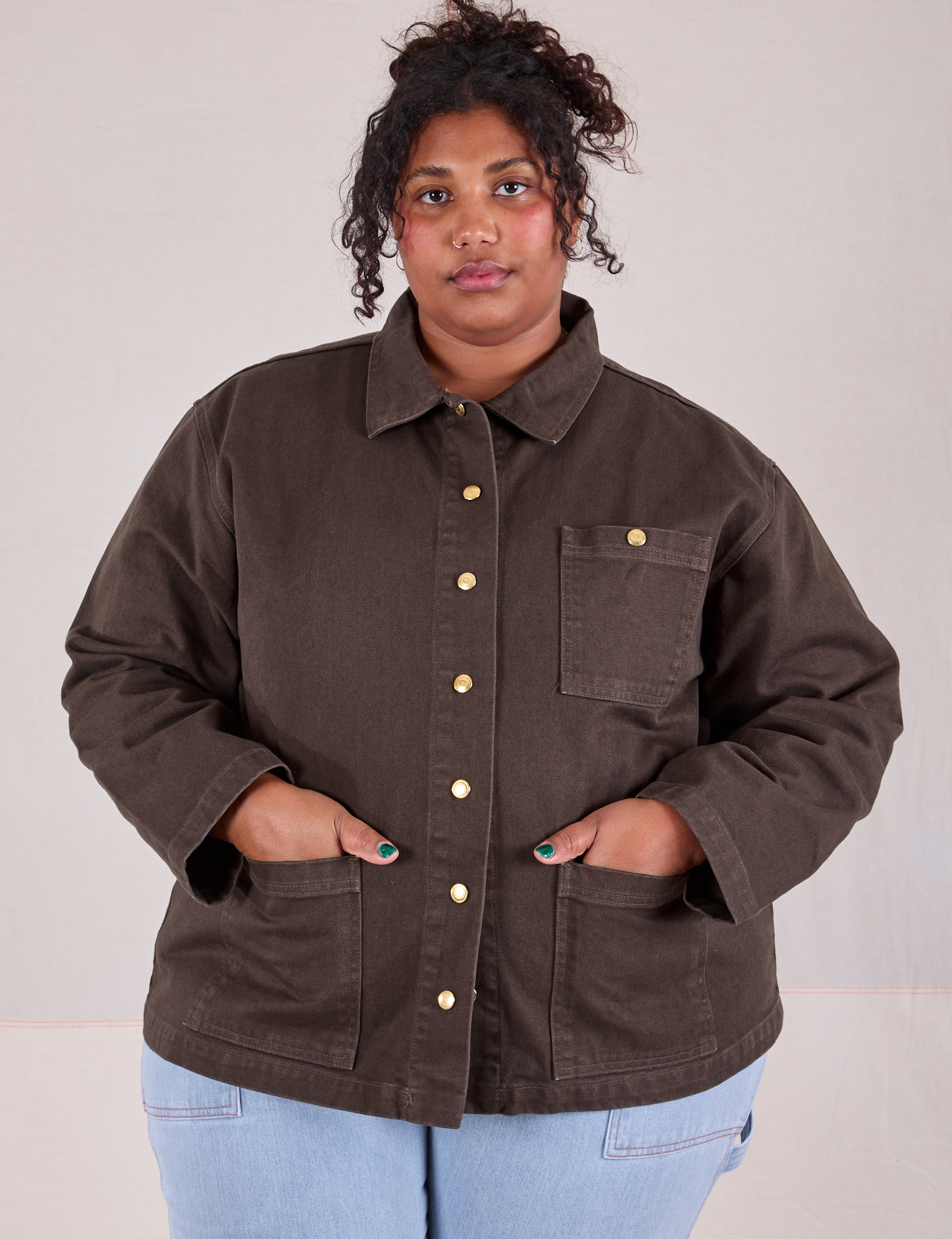 Morgan is wearing a buttoned up Denim Work Jacket in Espresso Brown