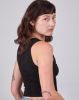 Cropped Tank Top in Basic Black angled back view on Alex