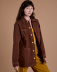 Front angled view of Ripstop Field Coat in Fudgesicle Brown on Alex