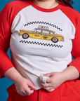 Taxi Raglan Tee in NYC front close up on Ashley