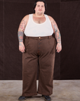 Sam is 5'10" and wearing 2XL Overdyed Wide Leg Trousers in Brown paired with Tank Top in vintage tee off-white
