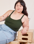 Ashley is wearing Cropped Cami in Swamp Green