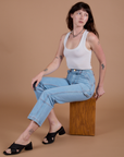 Carpenter Jeans in Light Wash and Cropped Tank in Vintage Tee White on Alex