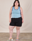 Ashley is wearing Colorblock Cropped Tank in Baby Blue and black Work Shorts