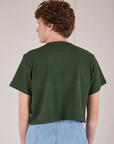 Cropped Burly Tee in Swamp Green back view on Quinn