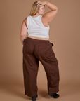 Back view of Drop Pocket Cargo Pants in Fudgesicle Brown and Cropped Tank in vintage tee white