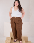 Checker Trousers in Brown & Black and Tank Top in vintage tee off-white worn by Ashley