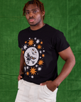 Halloween Organic Tee in Moon angled front view on Issac