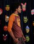 Raglan Tee in Jack-O-Lantern side view on Jerrod