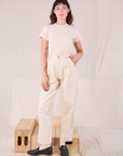 Alex is 5’8” and wearing XXS Heritage Trousers in Natural  paired with Organic Vintage Tee in vintage tee off-white