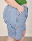 Close up side view of Carpenter Shorts in Light Wash on Ashley