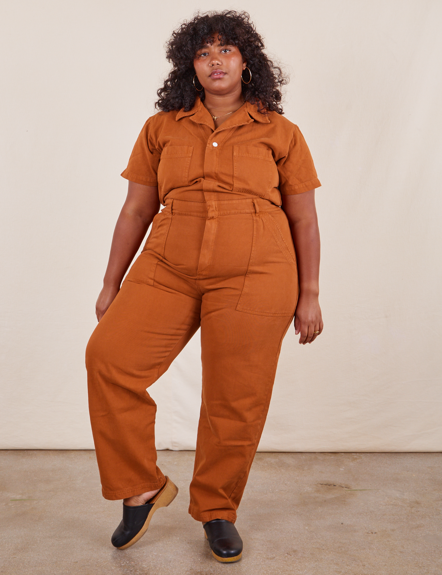 Morgan is 5’5” and wearing 2XL Short Sleeve Jumpsuit in Burnt Terracotta