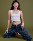 Lazy Daisy Mid-Rise Carpenter Jeans and vintage tee white Cropped Tank worn by Alex