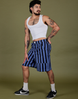 Angled front view of Longline Work Shorts in Cornflower and Cropped Tank in Vintage Tee White on Jesse