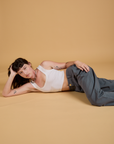 Baggy Mid-Rise Trousers in Slate Grey and Cropped Tank in Vintage Tee White worn by Alex