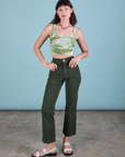 Alex is wearing Ocean and Sky in Cami and swamp green Work Pants