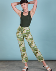 Alex is wearing Work Pants in Ocean and Sky and swamp green Tank Top
