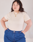Ashley is 5'7" and wearing L Organic Vintage Tee in Vintage Tee Off-White tucked into dark wash Trouser Jeans