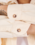 Sleeve cuff close up of Oversize Overshirt in Vintage Tee Off-White worn by Jesse