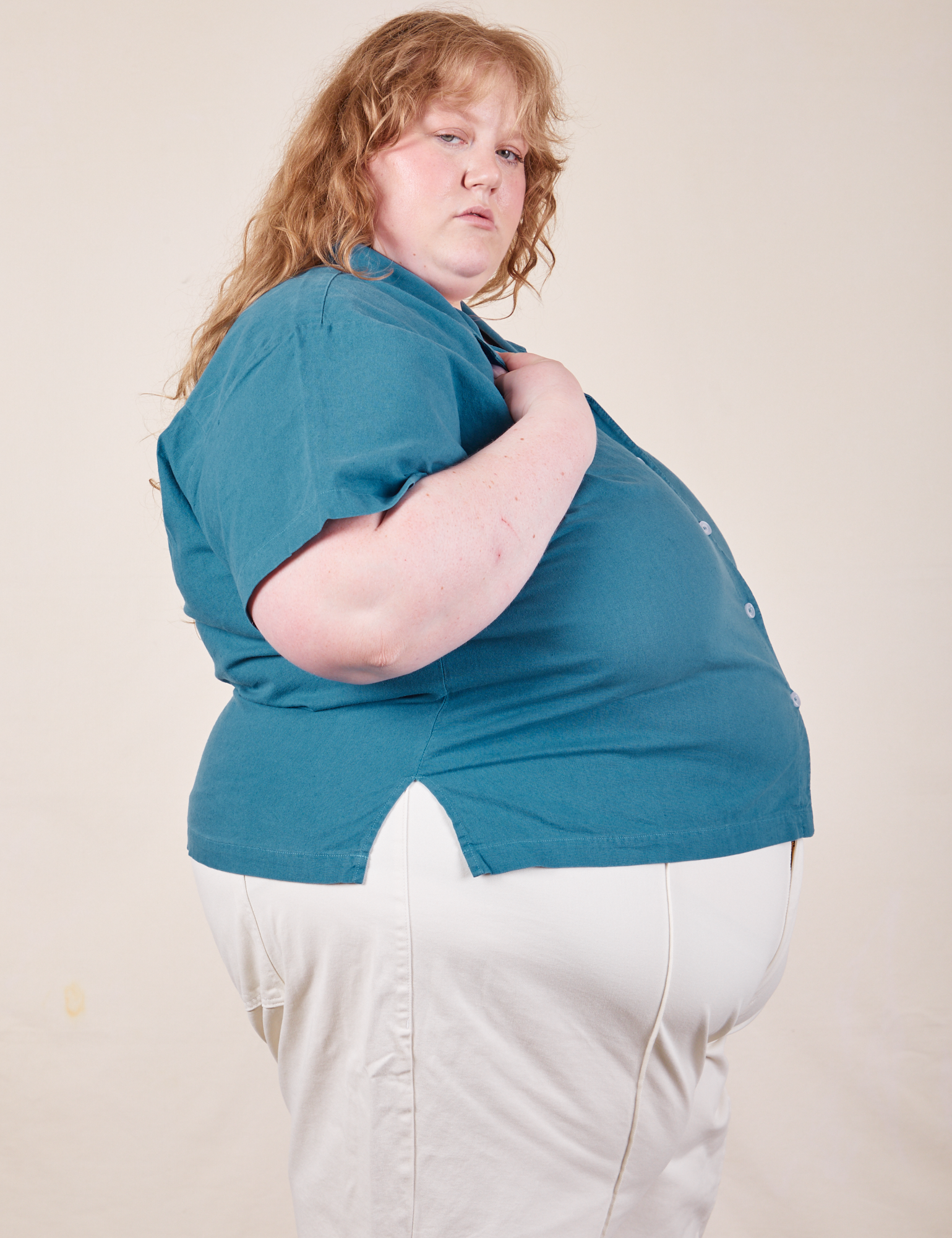 Side view of Pantry Button-Up in Marine Blue worn by Catie