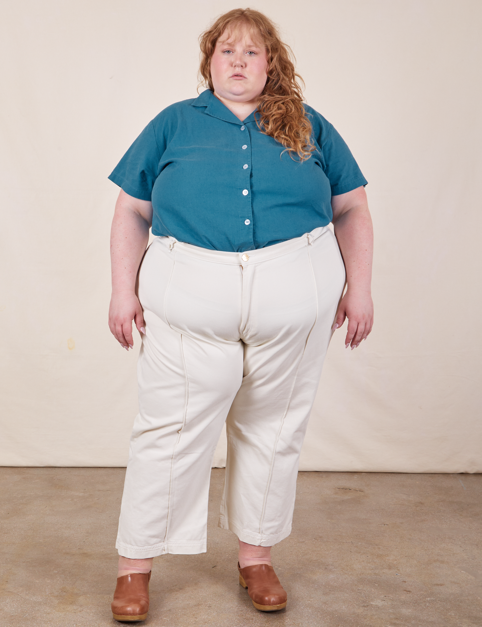 Catie is wearing Pantry Button-Up in Marine Blue and vintage tee off-white Western Pants