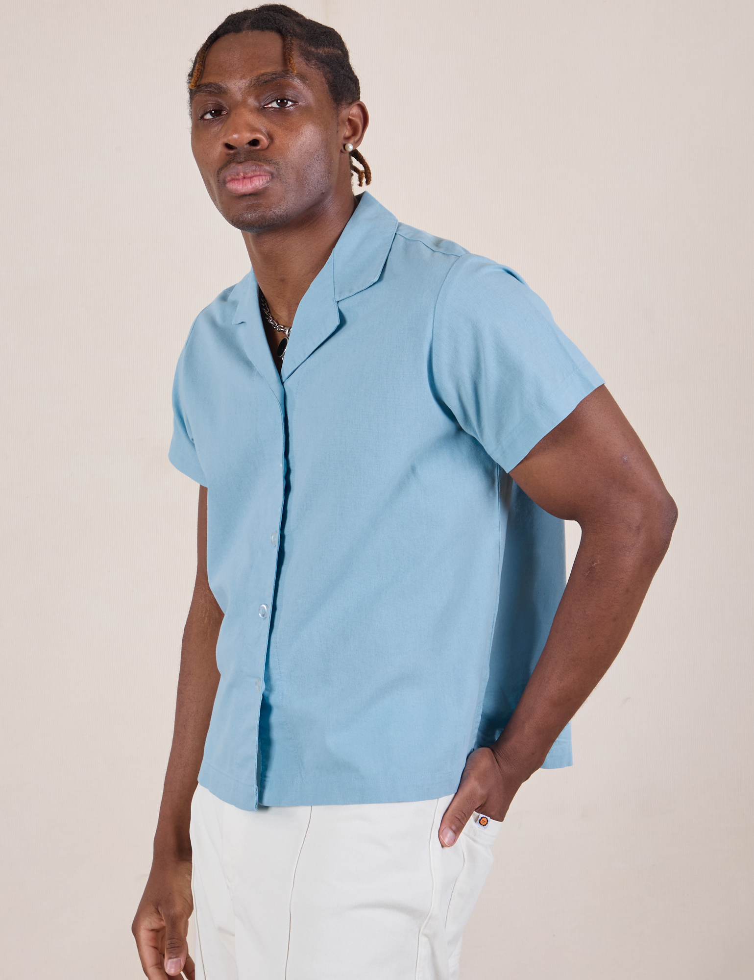 Pantry Button-Up in Baby Blue angled front view on Isaac