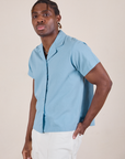 Pantry Button-Up in Baby Blue angled front view on Isaac
