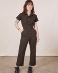 Hana is 5’3” and wearing XXS Petite Short Sleeve Jumpsuit in Espresso Brown