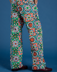 Quilt Print Jumpsuit pant leg close up on Anthony
