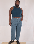 Elijah is 6’4” and wearing 3XL Railroad Carpenter Jeans in Baby Blue paired with marine blue Muscle Tee
