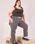 Angled front view of Railroad Carpenter Jeans in Vintage Tan and espresso brown Square Neck Tank