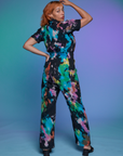 Short Sleeve Jumpsuit in Rainbow Magic Waters back view on Tiara