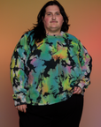 Sam is 5’10” and wearing 1XL Magic Waters Long Sleeve Burly Tee in Rainbow