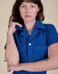 Front close up of Short Sleeve Jumpsuit in Royal Blue on Alex