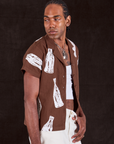Soda Bottle Pantry Button-Up in Fudgesicle Brown side view on Jerrod