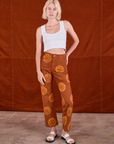 Paintstamped Work Pants in Orange and Cropped Tank in Vintage Tee Off-White on Madeline