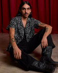 Spider Webs Pantry Button-Up and black Work Pants worn by Anthony
