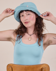 Wide Brim Denim Bucket Hat in Baby Blue worn by Alex