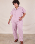 Miguel is 6'0" and wearing 2XL Short Sleeve Jumpsuit in Lilac