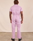 Short Sleeve Jumpsuit in Lilac back view on Issac